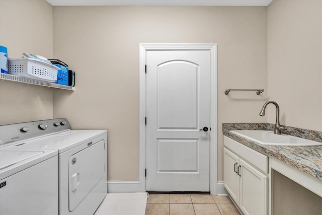4742 Leigh Ln, Roanoke, VA 24018 - washroom featuring independent washer and dryer, light tile patterned floors, cabinet space, and baseboards