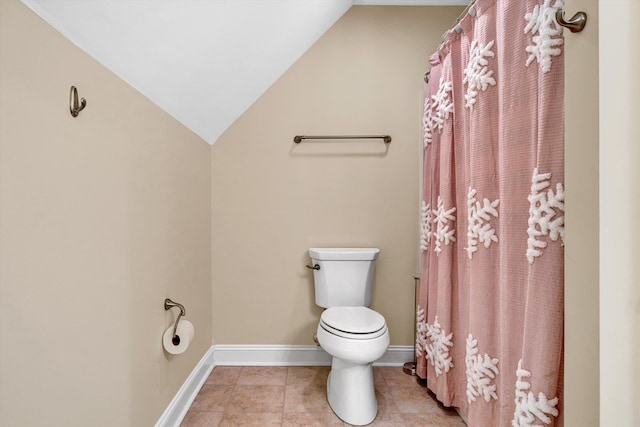 4742 Leigh Ln, Roanoke, VA 24018 - bathroom with toilet, vaulted ceiling, baseboards, curtained shower, and tile patterned flooring