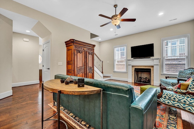 4742 Leigh Ln, Roanoke, VA 24018 - living room with ceiling fan, a fireplace, stairs, baseboards, and wood finished floors