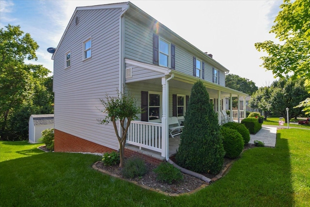 7268 Twin Forks Dr, Roanoke, VA 24019 - view of property exterior featuring covered porch and a yard