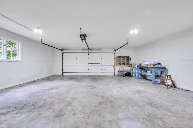 6695 Raintree Rd, Roanoke, VA 24018 - garage with baseboards and a garage door opener