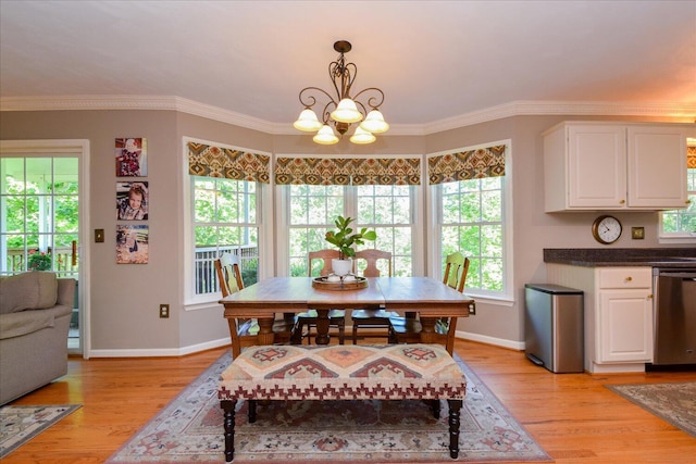7635 Peebles Ln, Roanoke, VA 24018 - dining area with a chandelier, light wood finished floors, baseboards, and ornamental molding