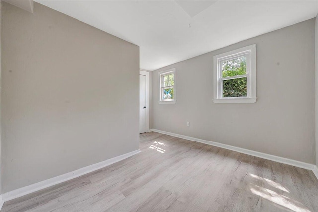 1120 6th St SE, Roanoke, VA 24013 - unfurnished room featuring light wood-style flooring and baseboards