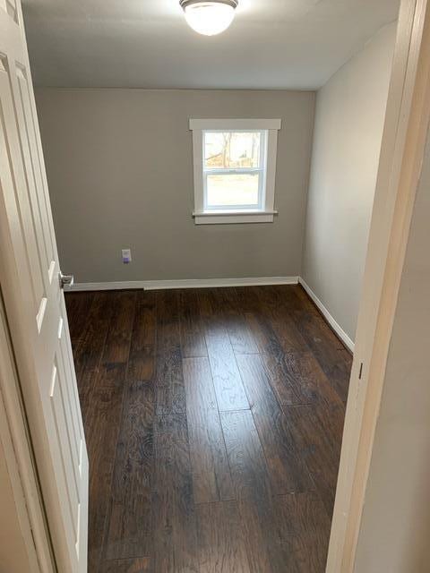 1120 6th St SE, Roanoke, VA 24013 - unfurnished room with baseboards and hardwood / wood-style floors