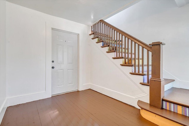 1120 6th St SE, Roanoke, VA 24013 - stairway featuring hardwood / wood-style flooring and baseboards