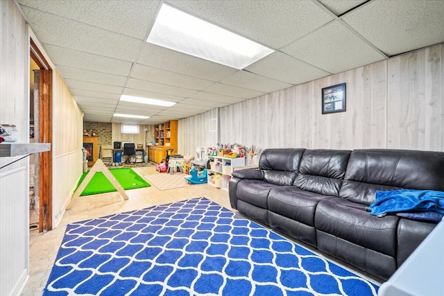 2136 Bainbridge Dr, Salem, VA 24153 - living area with a paneled ceiling, wooden walls, and a fireplace