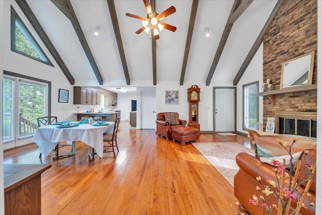 48 Overlook Rd, Hardy, VA 24101 - living room with beamed ceiling, light wood-type flooring, ceiling fan, high vaulted ceiling, and a fireplace