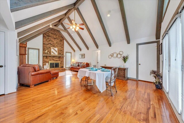 48 Overlook Rd, Hardy, VA 24101 - living area with light wood-style floors, beam ceiling, plenty of natural light, ceiling fan, and a brick fireplace
