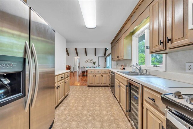 48 Overlook Rd, Hardy, VA 24101 - kitchen featuring stainless steel appliances, beverage cooler, a sink, beam ceiling, and light countertops