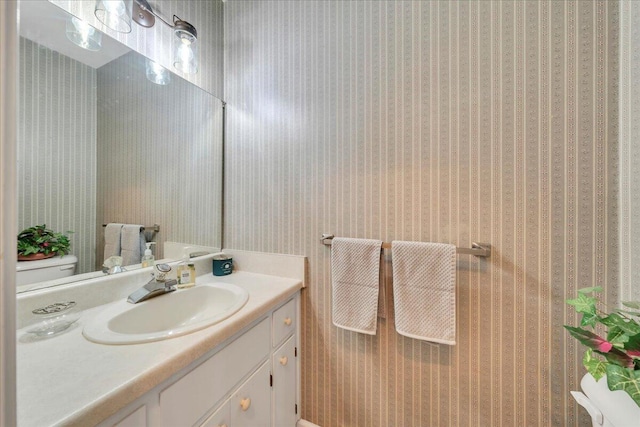 48 Overlook Rd, Hardy, VA 24101 - bathroom with vanity, wallpapered walls, and toilet