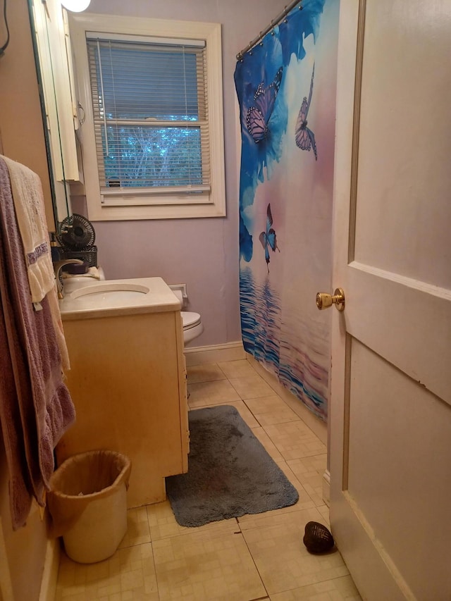 2521 Chatham St NW, Roanoke, VA 24012 - full bathroom with toilet, vanity, tile patterned floors, and a shower with curtain
