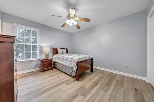 1152 Murray Ave SE, Roanoke, VA 24013 - bedroom featuring light wood-style flooring, baseboards, and a ceiling fan