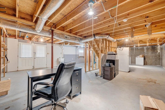 1152 Murray Ave SE, Roanoke, VA 24013 - unfinished basement with freestanding refrigerator and a desk