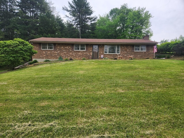 10496 Bent Mountain Rd, Bent Mountain, VA 24059 - ranch-style home with a chimney, brick siding, and a front yard