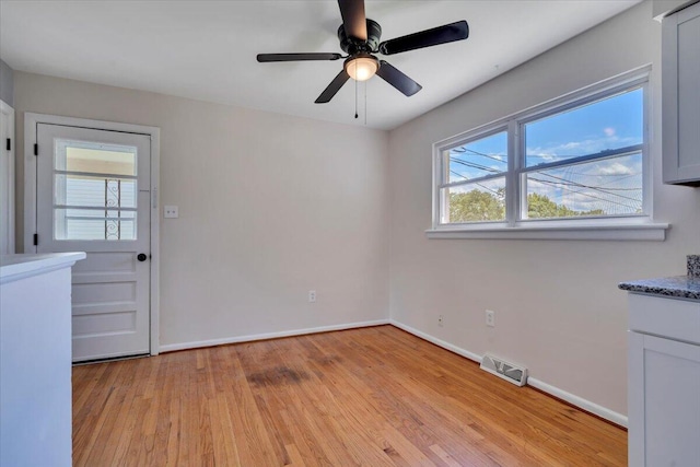 3734 Long Meadow Ave NW, Roanoke, VA 24017 - spare room with light wood-style floors, baseboards, and a ceiling fan