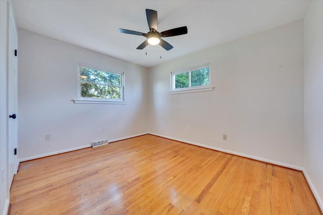 3734 Long Meadow Ave NW, Roanoke, VA 24017 - unfurnished room featuring wood finished floors, baseboards, and a ceiling fan