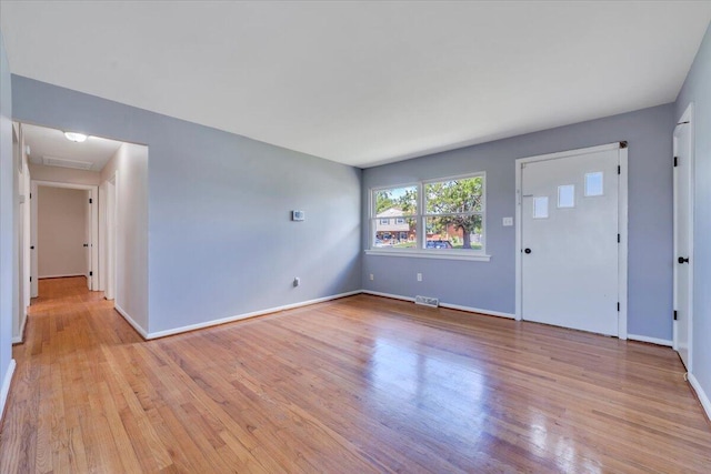 3734 Long Meadow Ave NW, Roanoke, VA 24017 - unfurnished living room with light wood-type flooring and baseboards
