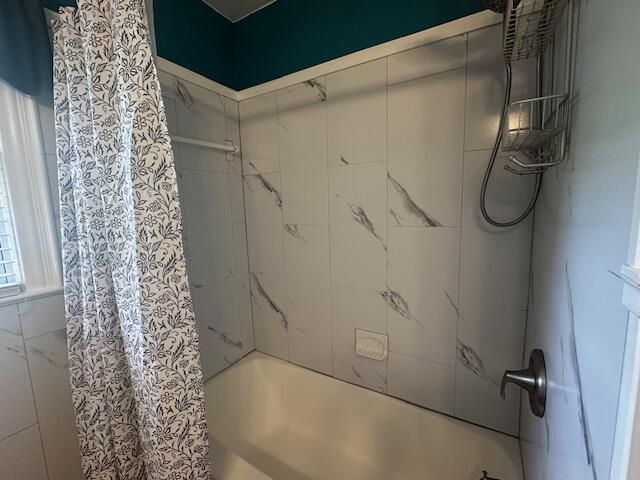586 Graceland Dr, Bassett, VA 24055 - bathroom with shower / tub combo with curtain