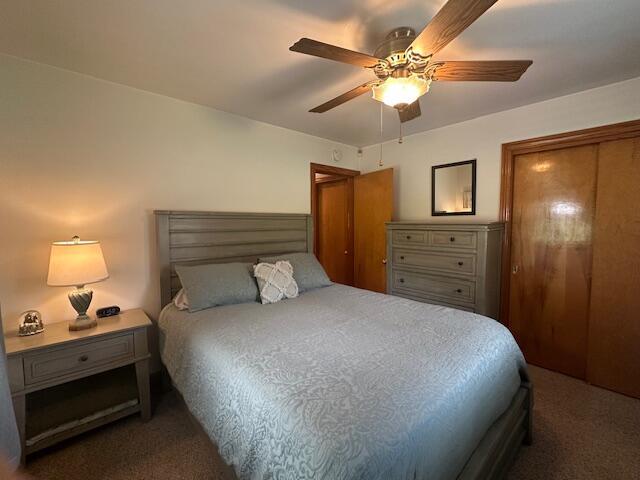 586 Graceland Dr, Bassett, VA 24055 - bedroom featuring carpet floors and a ceiling fan