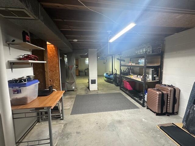 586 Graceland Dr, Bassett, VA 24055 - unfinished below grade area featuring heating unit