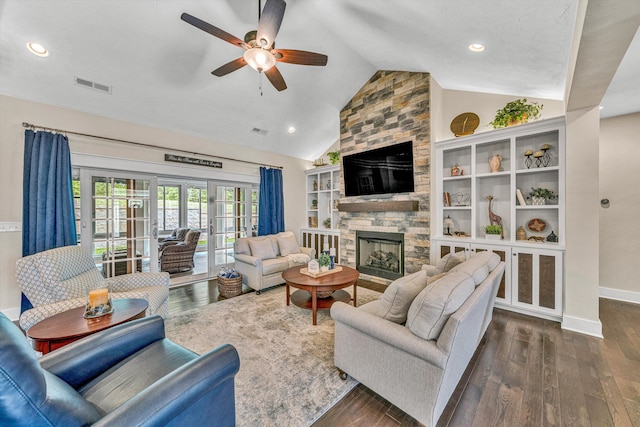 700 Thornblade Way, Blue Ridge, VA 24064 - living area with vaulted ceiling, dark wood finished floors, a ceiling fan, a stone fireplace, and baseboards