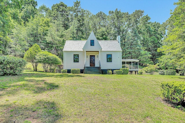 4816 Colonial Ave, Roanoke, VA 24018 - view of front of house with a front lawn and a sunroom