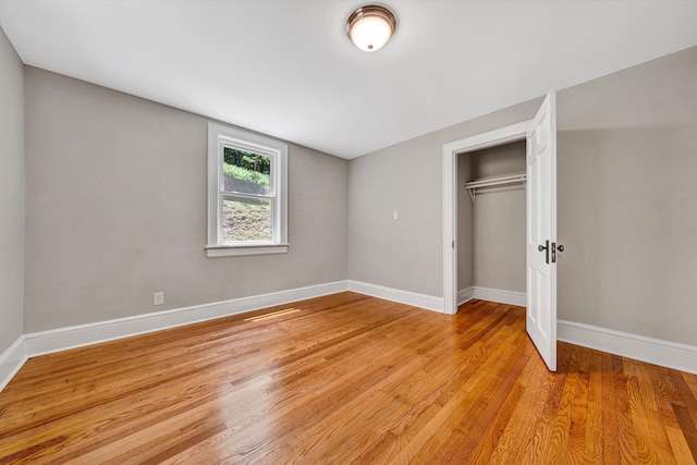 4816 Colonial Ave, Roanoke, VA 24018 - unfurnished bedroom featuring light wood finished floors, baseboards, and a closet