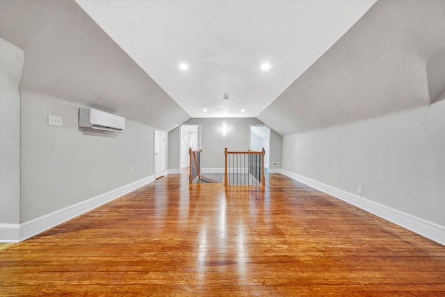 4816 Colonial Ave, Roanoke, VA 24018 - bonus room with an AC wall unit, wood finished floors, lofted ceiling, and baseboards