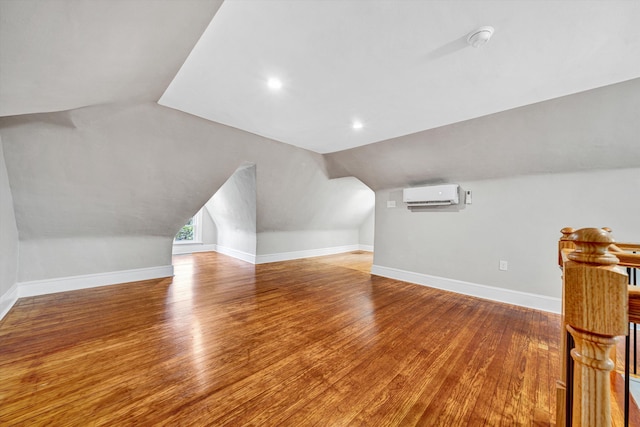 4816 Colonial Ave, Roanoke, VA 24018 - bonus room with a wall unit AC, vaulted ceiling, wood finished floors, baseboards, and recessed lighting