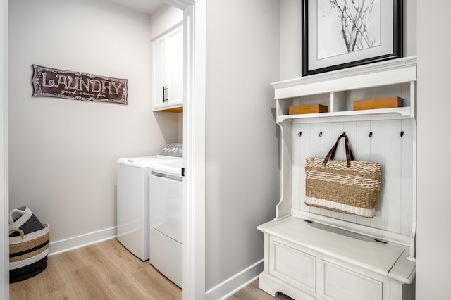 7272 Fairway Ridge Cir, Salem, VA 24153 - washroom featuring cabinet space, light wood-style floors, separate washer and dryer, and baseboards