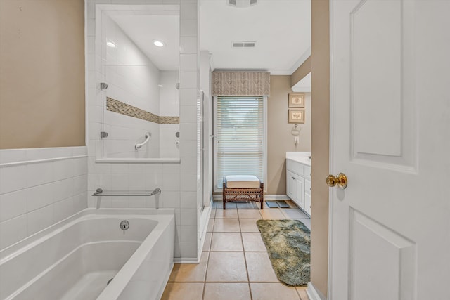 402 Anchor Dr, Moneta, VA 24121 - bathroom with vanity, a garden tub, a shower stall, and tile patterned flooring