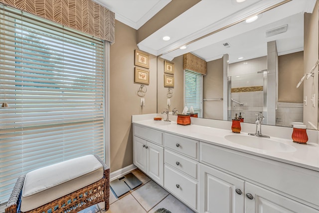 402 Anchor Dr, Moneta, VA 24121 - bathroom with double vanity, a shower stall, tile patterned floors, baseboards, and ornamental molding