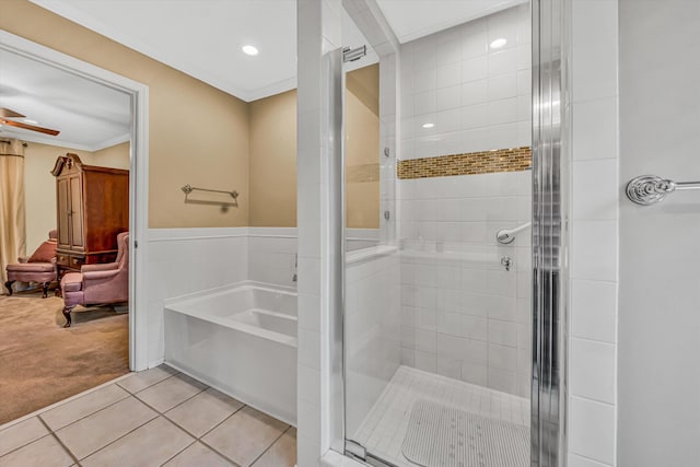 402 Anchor Dr, Moneta, VA 24121 - bathroom with a bath, a stall shower, tile patterned floors, recessed lighting, and a wainscoted wall