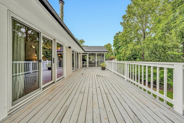 402 Anchor Dr, Moneta, VA 24121 - wooden terrace with a sunroom