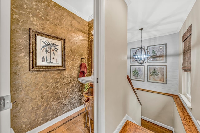 402 Anchor Dr, Moneta, VA 24121 - staircase featuring baseboards, a chandelier, crown molding, tile patterned floors, and wallpapered walls
