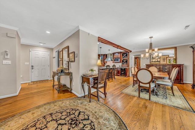402 Anchor Dr, Moneta, VA 24121 - dining area with light wood finished floors, a chandelier, baseboards, crown molding, and recessed lighting