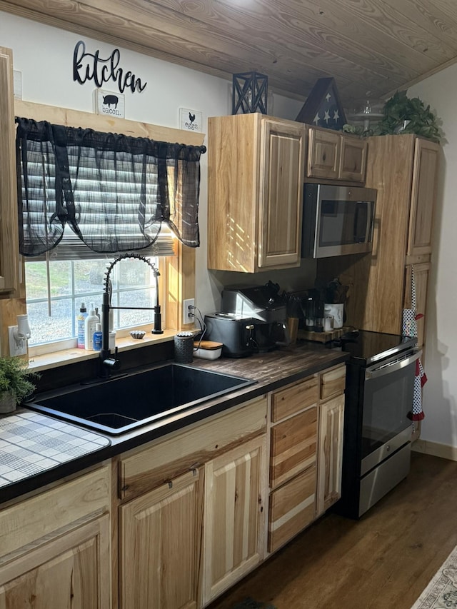 7506 Roaring Run Rd Unit 1, Covington, VA 24426 - kitchen with appliances with stainless steel finishes, a sink, tile countertops, and dark wood-style flooring