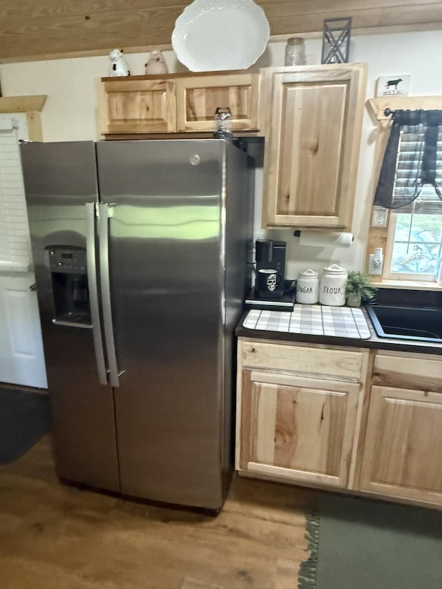 7506 Roaring Run Rd Unit 1, Covington, VA 24426 - kitchen featuring stainless steel refrigerator with ice dispenser, light brown cabinetry, wood finished floors, and tile counters