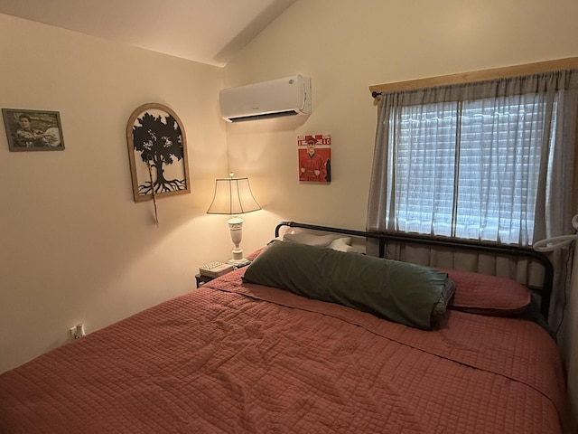 7506 Roaring Run Rd Unit 1, Covington, VA 24426 - bedroom with a wall unit AC and lofted ceiling