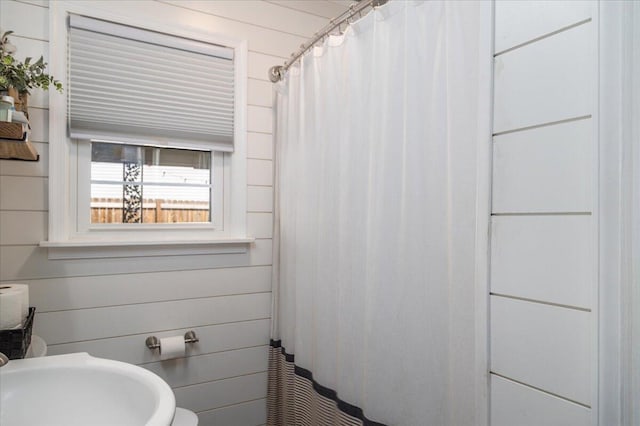 160 Mountain View Dr, Rocky Mount, VA 24151 - full bath featuring a sink, a shower with shower curtain, wooden walls, and toilet