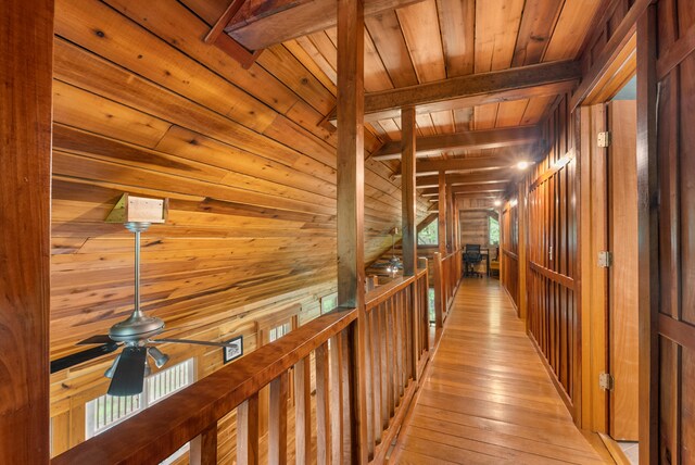 1539 Wheats Valley Rd, Bedford, VA 24523 - hall with wooden walls, wooden ceiling, and light wood-style flooring