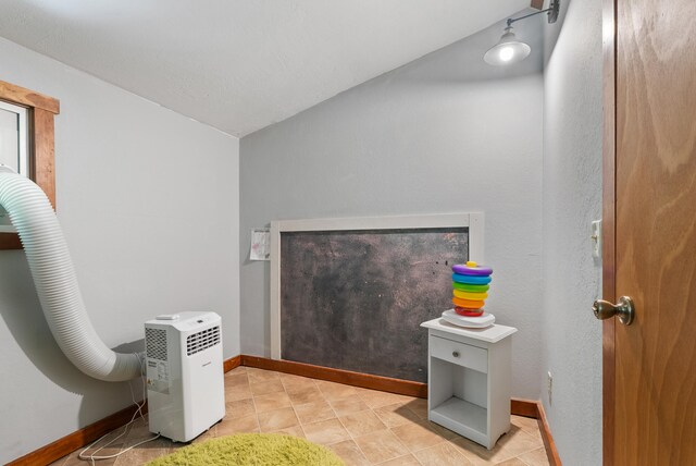 1539 Wheats Valley Rd, Bedford, VA 24523 - bathroom featuring baseboards and vaulted ceiling