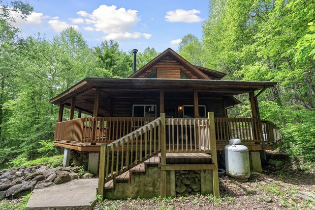 1539 Wheats Valley Rd, Bedford, VA 24523 - log-style house featuring a wooden deck, a forest view, and stairs