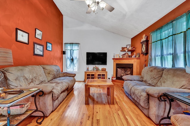 7123 Tall Oak Ln, Roanoke, VA 24018 - living area with vaulted ceiling, healthy amount of natural light, a ceiling fan, and hardwood / wood-style floors