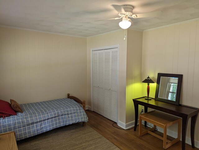 150 Harvey St, Rocky Mount, VA 24151 - bedroom with wood finished floors, a closet, crown molding, baseboards, and a ceiling fan