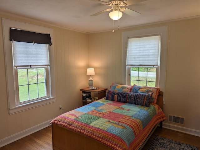 150 Harvey St, Rocky Mount, VA 24151 - bedroom with wood-type flooring, multiple windows, baseboards, and ornamental molding