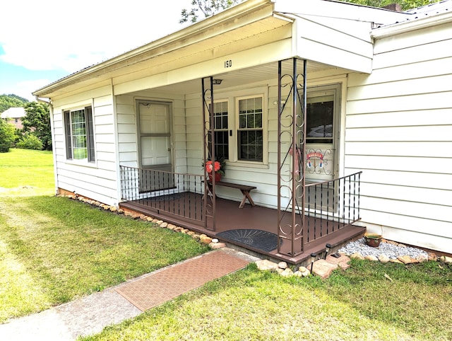 150 Harvey St, Rocky Mount, VA 24151 - view of exterior entry with a yard and a porch
