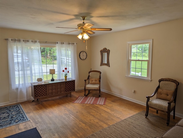 150 Harvey St, Rocky Mount, VA 24151 - sitting room featuring wood finished floors, ceiling fan, and baseboards