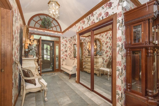 157 Burks Hollow Rd SW, Willis, VA 24380 - foyer with wallpapered walls, lofted ceiling, and a chandelier