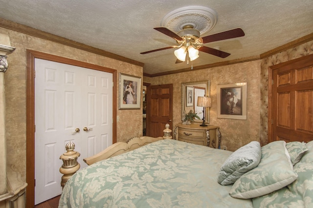 157 Burks Hollow Rd SW, Willis, VA 24380 - bedroom with crown molding, ceiling fan, wood finished floors, and a textured ceiling